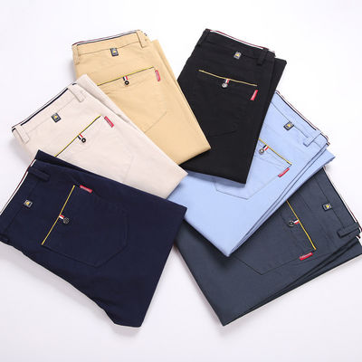 XMAMLON RTSのカキ色の男性用服装用綿パンツ