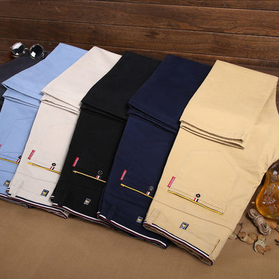 XMAMLON RTSのカキ色の男性用服装用綿パンツ
